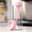 Zuutii Infusion Pitcher, 1.2L - Sakura Pink on the kitchen counter with a lid