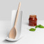 Blim Plus Stand Ladle Rest - Arctic White with a wooden spoon