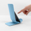 Blim Plus Stand Ladle Rest - Ocean Medium with a phone
