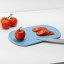 Blim Plus Skateboard Chopping Board - Ocean Medium on the kitchen counter