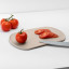 Blim Plus Skateboard Chopping Board - Moka Grey on the kitchen counter