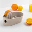 Blim Plus Oblo Juicer - Moka Grey on the table