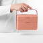 Blim Plus Bauletto Lunchbox, Medium - Flamingo Pink held on the kitchen counter