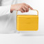 Blim Plus Bauletto Lunchbox, Medium - Desert Medium held on the kitchen counter