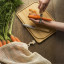 Pebbly Chef Prep Kit, Set of 3 on the table with a peeled carrot