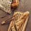 Pebbly Bread Baker Gift Pack, Set of 3 on the able with bread