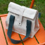 Pebbly Cotton Lunch Bag - Duck Blue on the table
