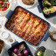 Maxwell & Williams Indulgence Lasagne Dish, 36cm - Slate Blue on dinner table