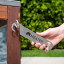 Meater Magnetic Hanger and Bottle Opener on the side of a table hanging