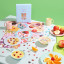 Piecework Puzzles Early Bird 1000 Piece Puzzle on the table with cereal bowels