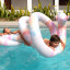 Sunnylife Giant Inflatable Noodle Snake - Tie Dye in a pool