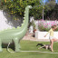 Sunnylife Giant Dino Sprinkler in the lawn