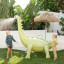 Sunnylife Giant Dino Sprinkler in the lawn