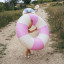 Sunnylife Tube Pool Ring - Bubblegum Pink showing scale