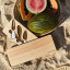 Sunnylife Le Weekend Travel Cheese Board Set on beach sand