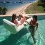 Sunnylife Luxe Lie-On Lounger Float - The Vacay Sage in a pool