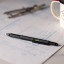 Gentlemens Hardware 6-in-1 Tooling Pen on the table