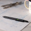 Gentlemens Hardware 6-in-1 Tooling Pen on the table