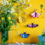 Studio ROOF Yellow Butterfly Wall Decor on the wall
