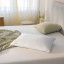 Tempur Prima Pillow - Medium on the bed