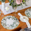 Skoert Eucalyptus Disposable Placemats, Pack of 25 on the table with cutlery