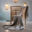 Aranda Cobblestone Melody Throw, 150cm x 200cm on a chair
