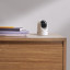 Eufy 2K Pan & Tilt Indoor Security Camera on a side drawer