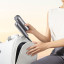 Dreame All-In-One Portable High-Speed Hair Dryer, 1000W - Grey being packed into backpack