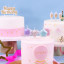 PME Happy Birthday Candle - Gold on a cake