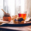 Doubleshot Coffee & Tea Premium Loose Leaf Strawberries & Cream Rooibos Tea, 50g on the table