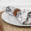 Nicolson Russell Dark Wood Napkin Rings, Set of 4 on a napkin