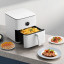 Xiaomi Smart Air Fryer, 6.5L with food on the table