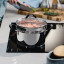 Tramontina Solar Stainless Steel Steamer Set, 2-Piece on the stove