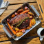 Ooni Roasting Pan - Large with food on the table