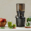 Kuvings Auto10 Cold Press Juicer - Black Pearl on the table