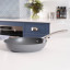 Laura Ashley Non-Stick Frying Pan, 28cm - Dark Slate on the countertop 
