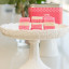 Navinos Coconut Ice Fudge on a cake stand