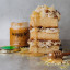 Waggle Spiced Craft Honey, 340g with a slice of cake