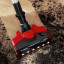 Bosch ProAnimal Rechargeable Cordless Vacuum Cleaner vacuuming spilt soil