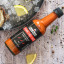 Black Mamba Foods Cayenne Chilli Sauce, 180ml with food on the table