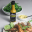 Black Mamba Foods Habanero Chilli Sauce, 180ml with food on the table