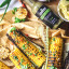 Black Mamba Foods Jalapeno Chilli Sauce, 180ml with food on the table