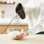 Moulinex Quick Mix Hand Mixer, 300W in use with cream
