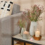 Thread Office White Frosted Raw Edge Candle Holder on side table with vases