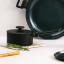 Cosy & Trendy Full Black Ceramic Non-Stick Saucepan, 16cm on the kitchen counter
