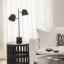 Hertex HAUS Serenity Bedside Lamp - Tarnished on a side table