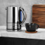 Dualit Architect Cordless Kettle, 1.5L - Black with a cup and saucer