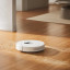 Dreame 2nd Generation D10 Plus Smart Dreambot Robot Vacuum Cleaner vacuuming dirt on wooden floor