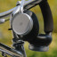Bang & Olufsen H100 Beoplay Noise Cancelling Headphones - Infinite Black on a bicycle