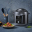 Instant Pot Duo Plus with Whisper Quiet 9-in-1 Smart Cooker, 6L with food on the table